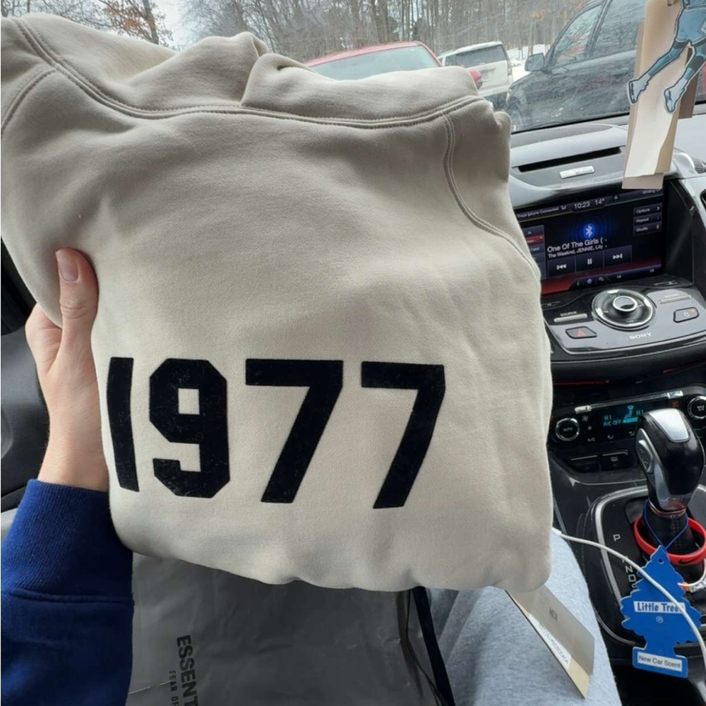 Essentials Cream Hoodie with Black 1977 Design
